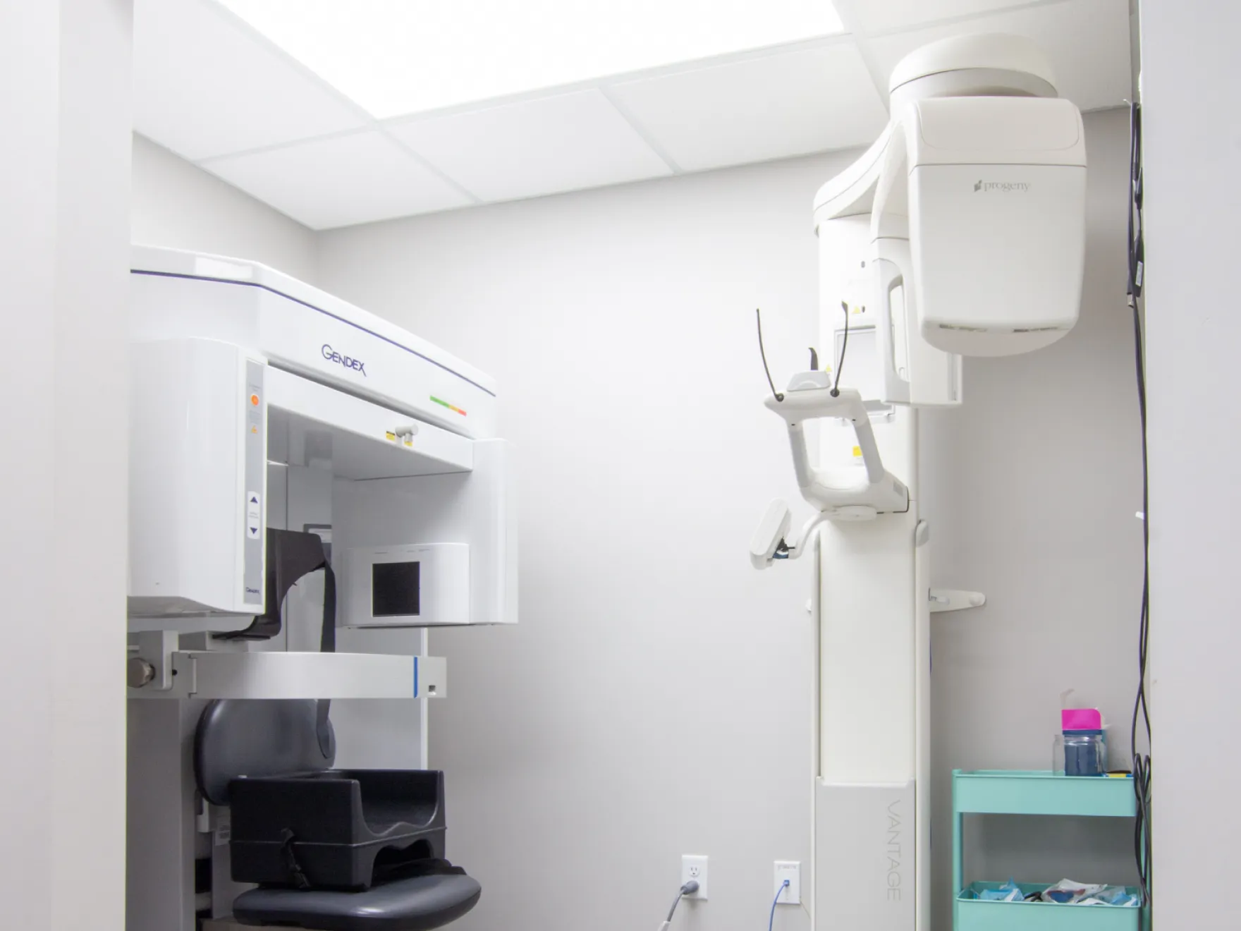 a medical room with a toilet and a sink